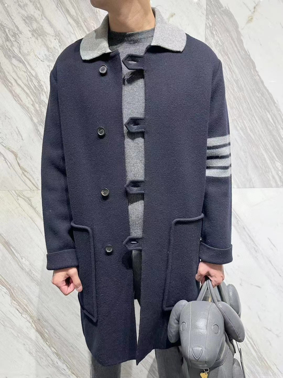 Men's COAT by Thom Browne, outerwear detail view