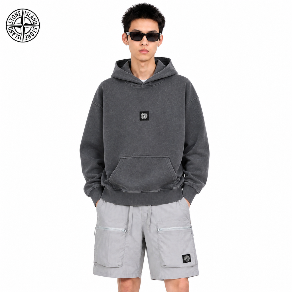 Stone Island Washed Compass Badge Pullover Hoodie on male model - front view