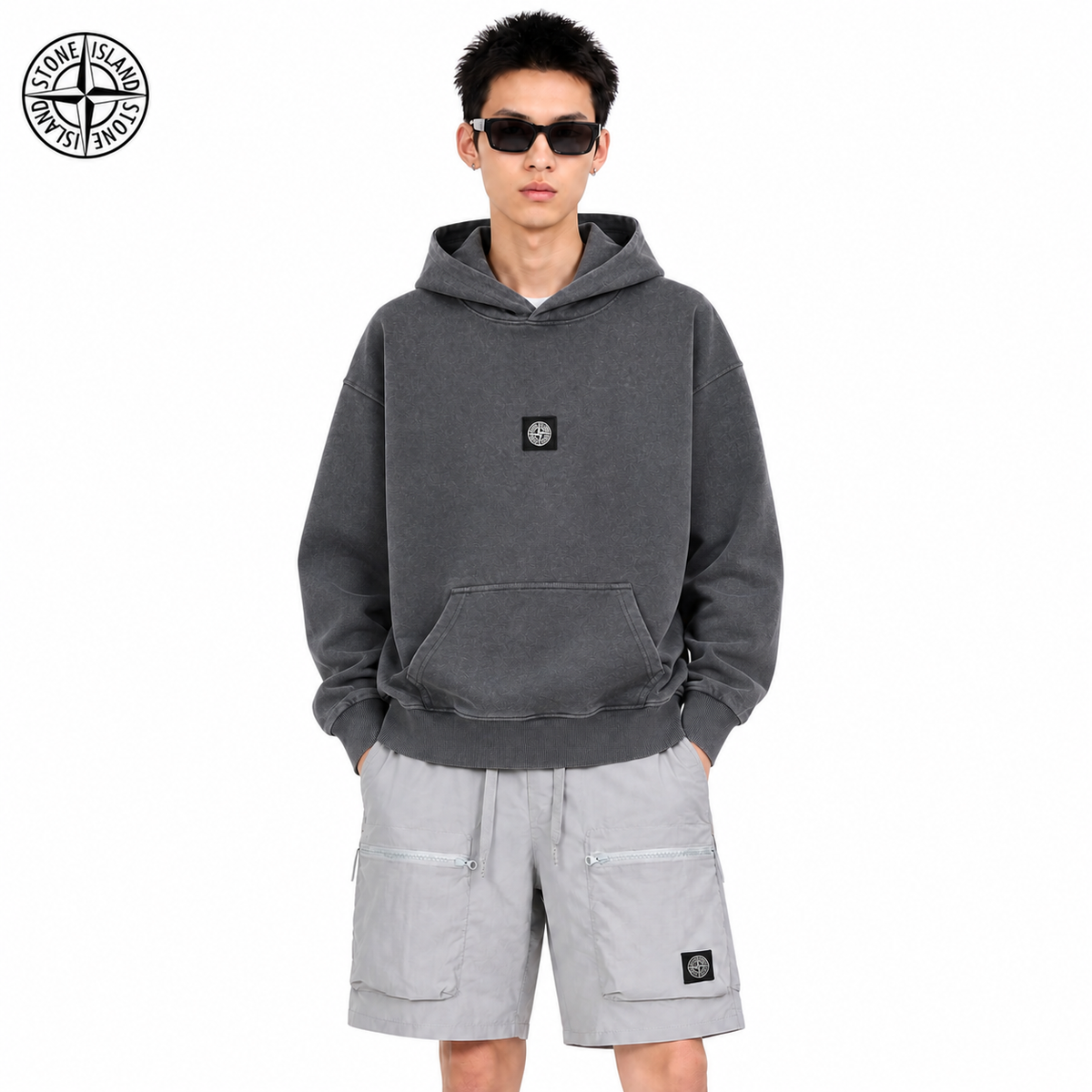 Stone Island Washed Compass Badge Pullover Hoodie on male model - front view