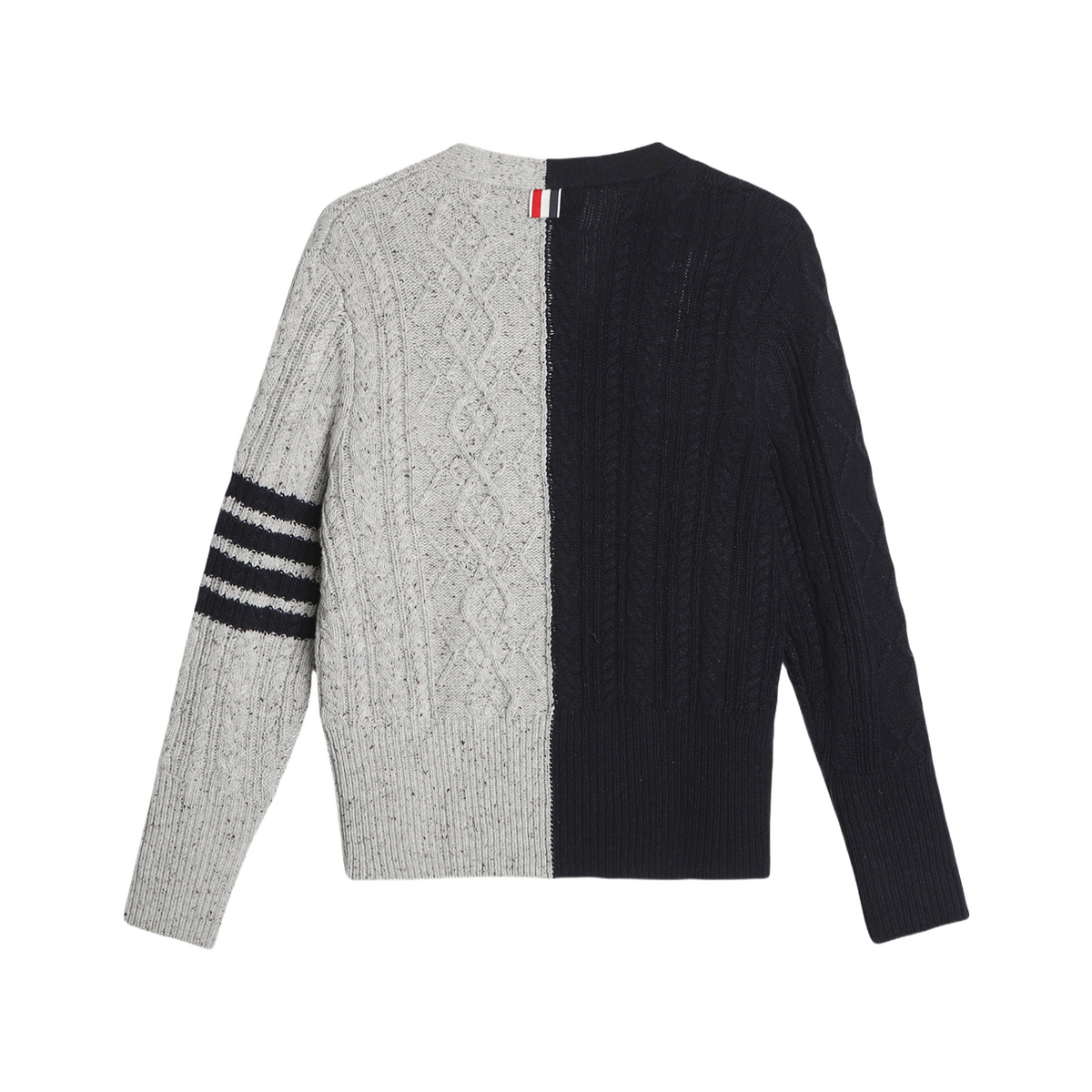 Cable knit cardigan by Thom Browne, knitwear detail view
