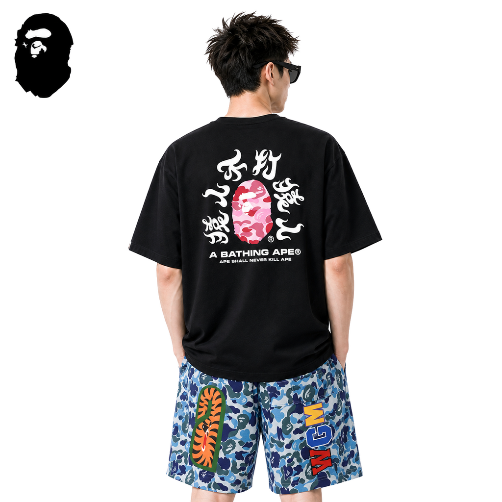 BAPE Pink ABC Camo Kanji Back Print Men's T-Shirt - Black - Black streetwear model on pure white background