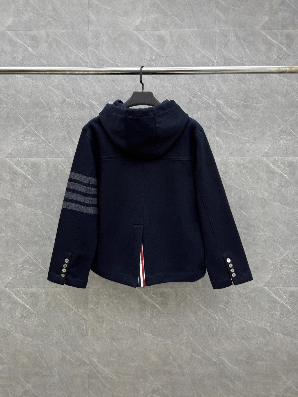 Hooded jacket by Thom Browne, outerwear detail view