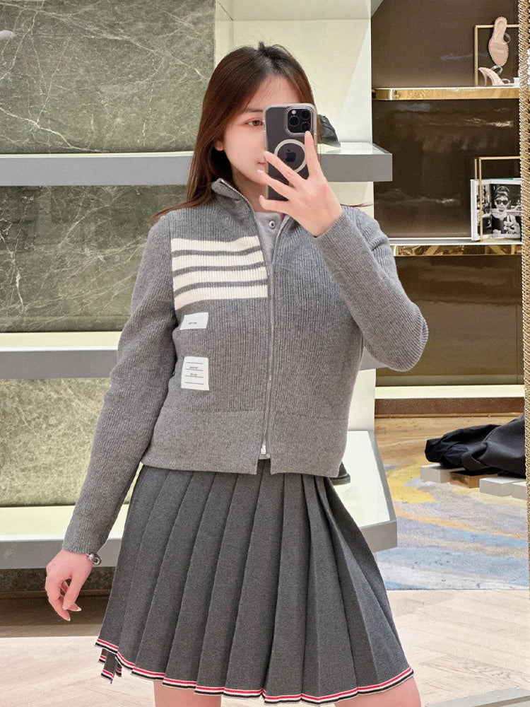 Unisex double-sided fake two-piece jacket by Thom Browne, outerwear detail view