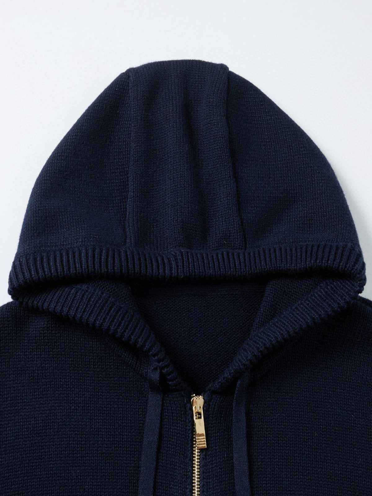 Unisex cardigan by Thom Browne, outerwear detail view