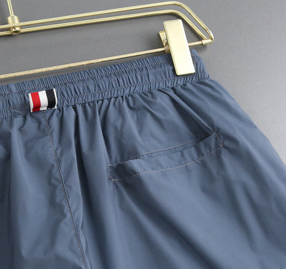 Four-bar beach shorts THOM TREND