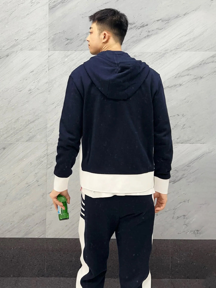 Colorblock Four-Bar Hoodie by Thom Browne, garment detail view