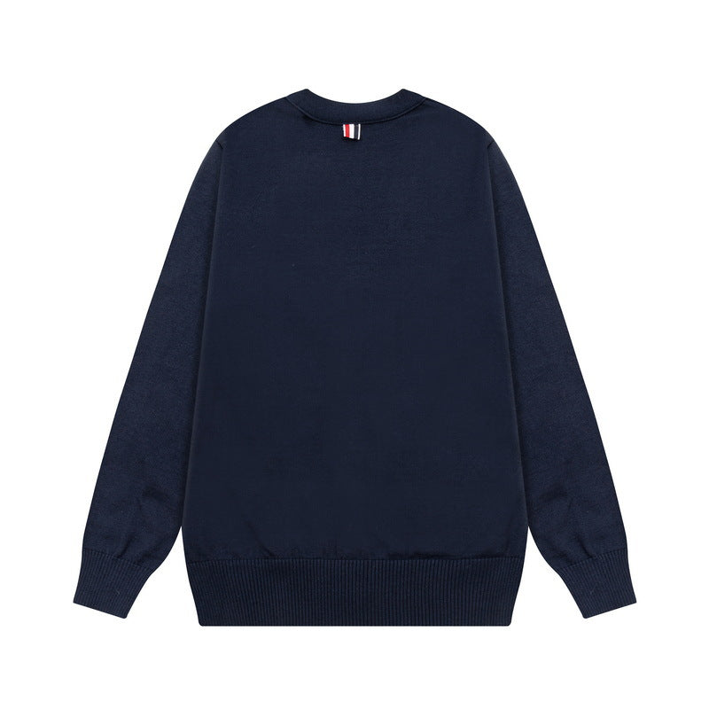 Men's cardigan by Thom Browne, knitwear detail view
