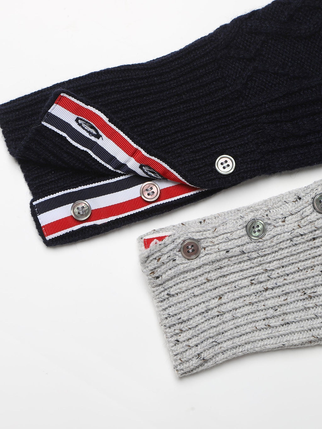 Cable knit cardigan by Thom Browne, knitwear detail view