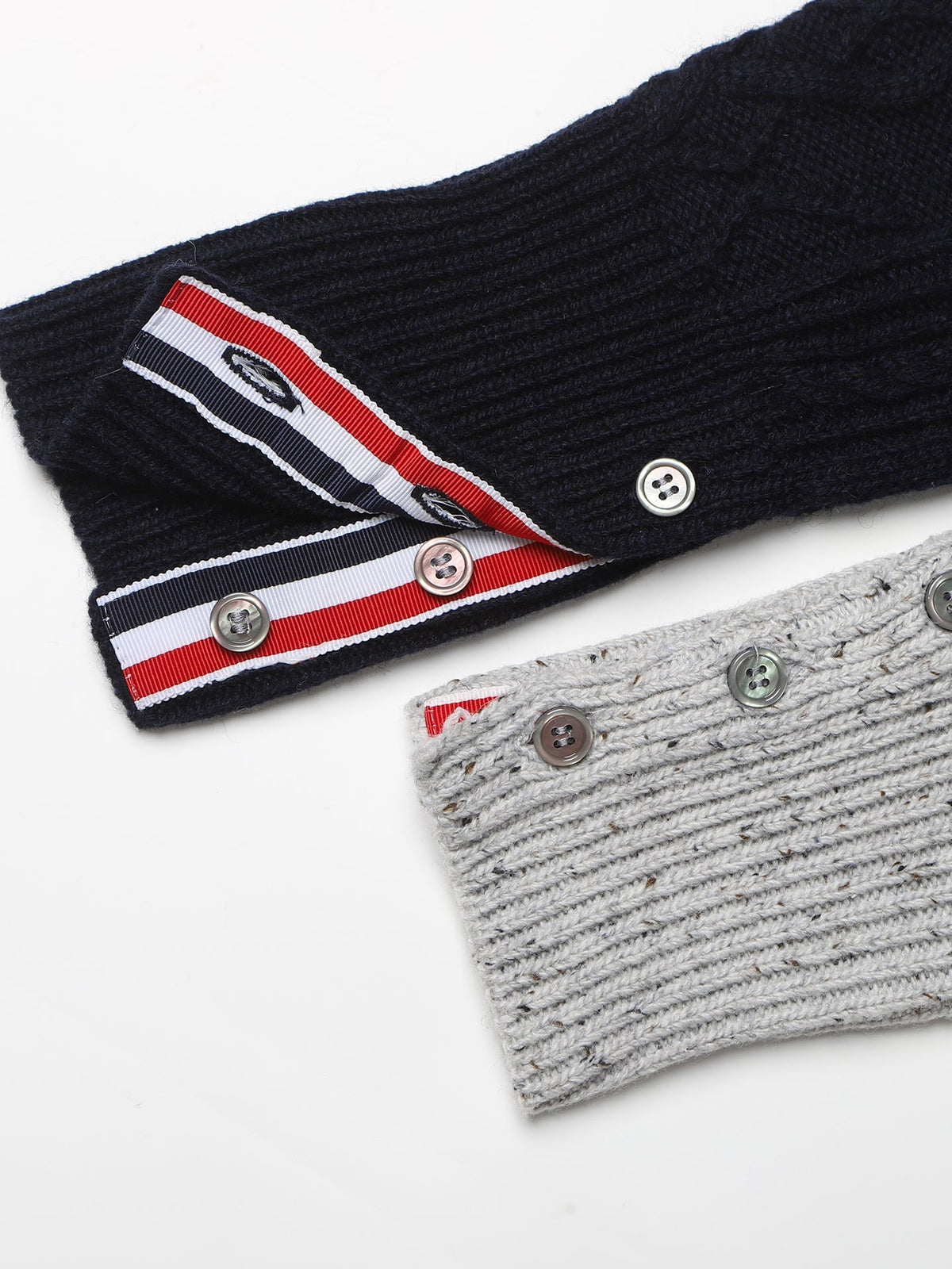 Cable knit cardigan by Thom Browne, knitwear detail view
