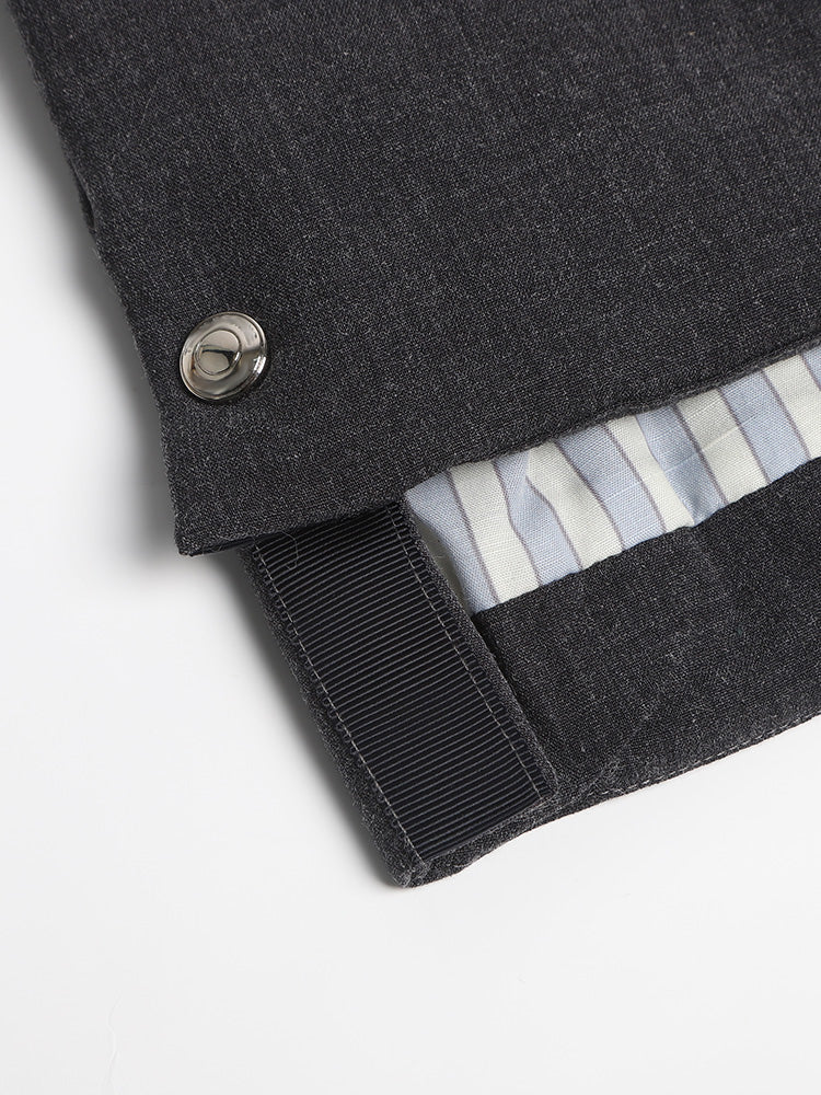 Unisex vest jacket by Thom Browne, outerwear detail view