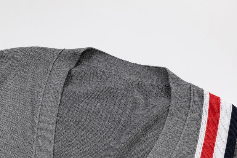 Men's cardigan by Thom Browne, knitwear detail view