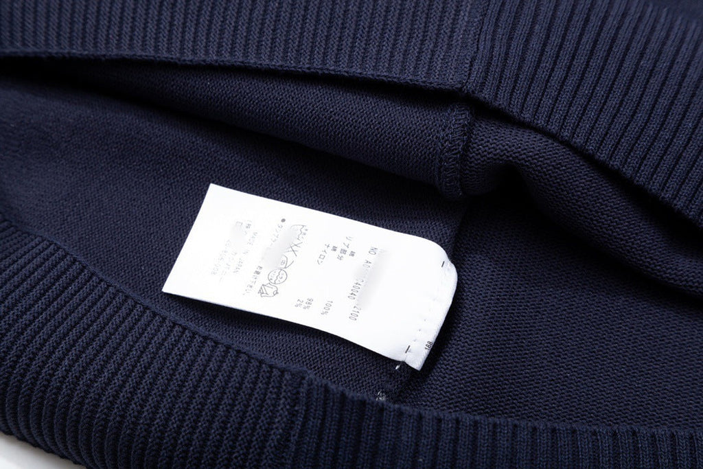 Classic Knit Polo by Thom Browne, product detail view