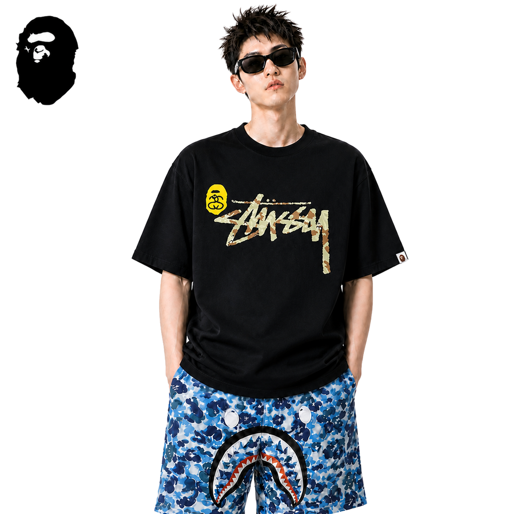 BAPE x Stussy Shark Logo Men's T-Shirt - Black - Black streetwear model on pure white background