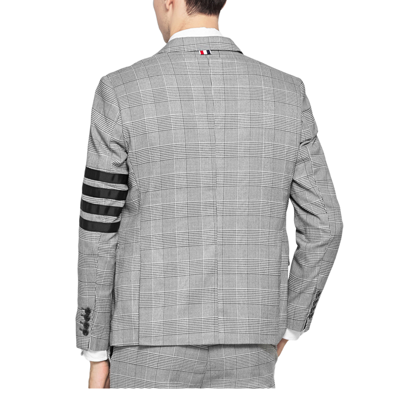 Plaid suit by Thom Browne, outerwear detail view