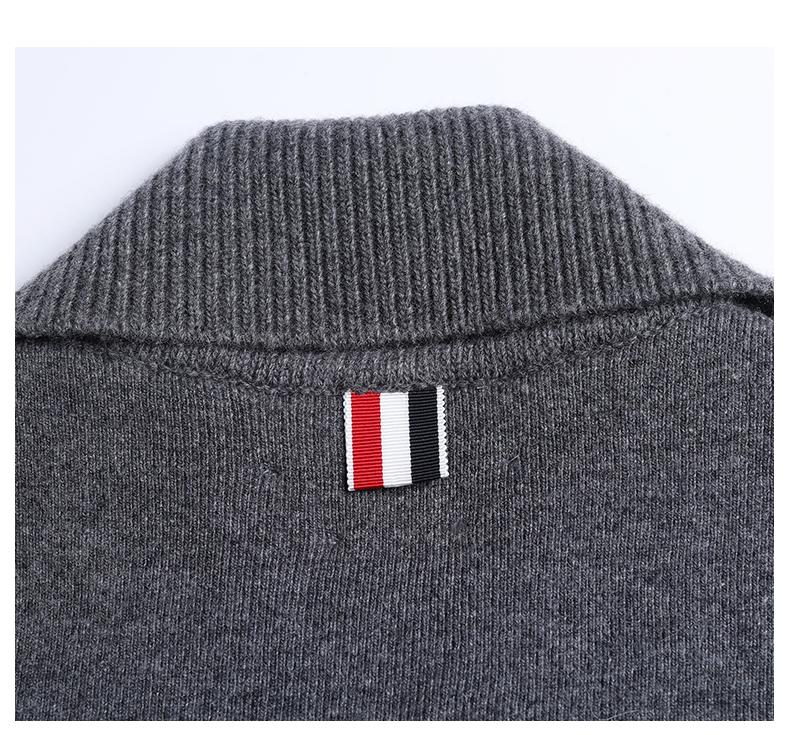 Men's coat by Thom Browne, outerwear detail view