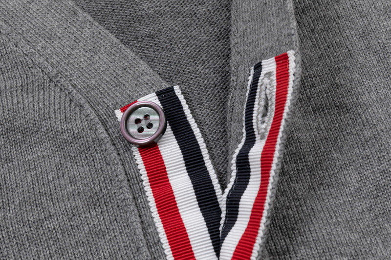 Men's cardigan by Thom Browne, knitwear detail view