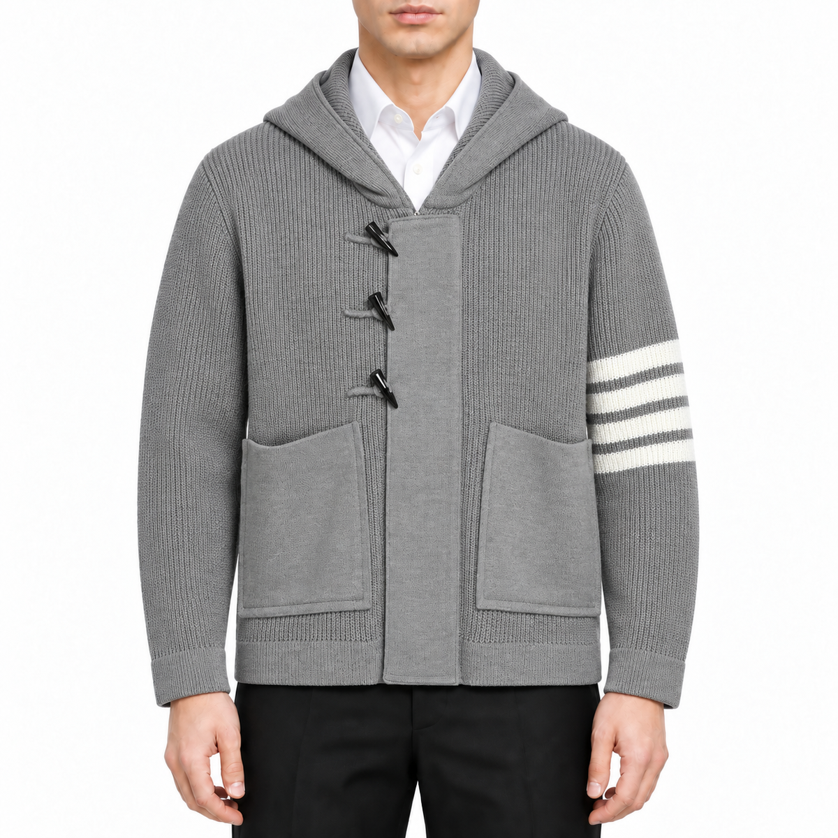 Unisex Chunky Knit Jacket by Thom Browne, modeled on a pure white background