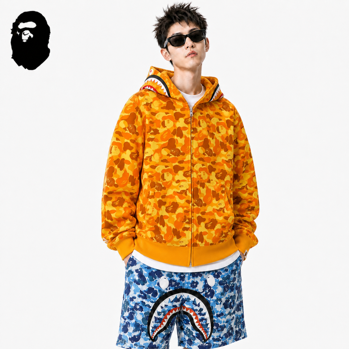 BAPE Orange Camo Shark Hoodie styled on a male model