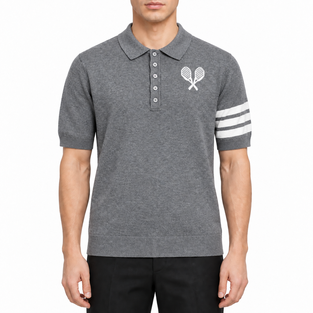 Tennis Racket Jacquard Polo Shirt by Thom Browne, modeled on a pure white background