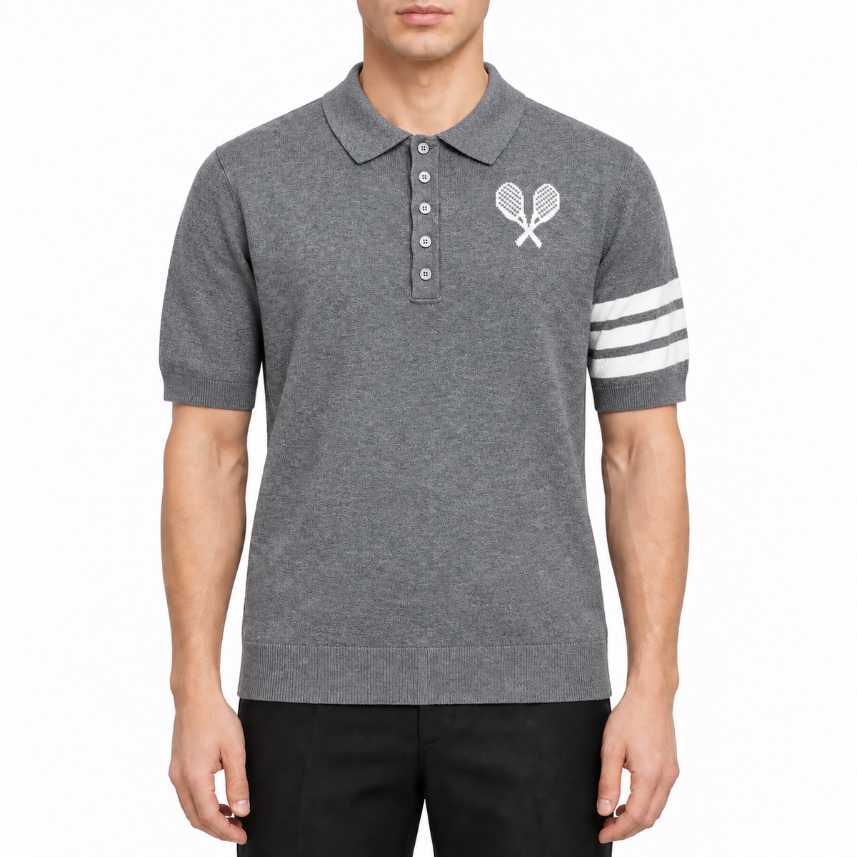Tennis Racket Jacquard Polo Shirt by Thom Browne, modeled on a pure white background