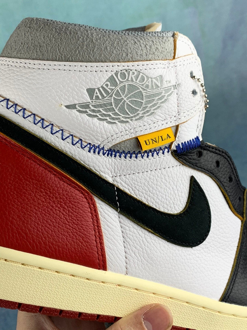 Air Jordan 1 High Black, White, and Red Unisex Sneakers BV1300-106 detail view 4