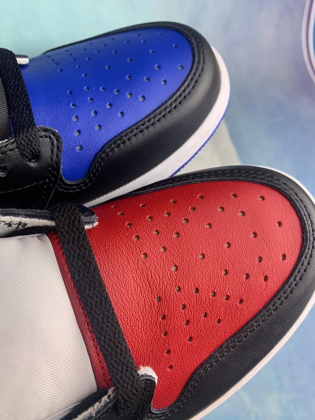 Air Jordan 1 High White, Blue, and Red Asymmetrical Pair Unisex Sneakers detail view 6