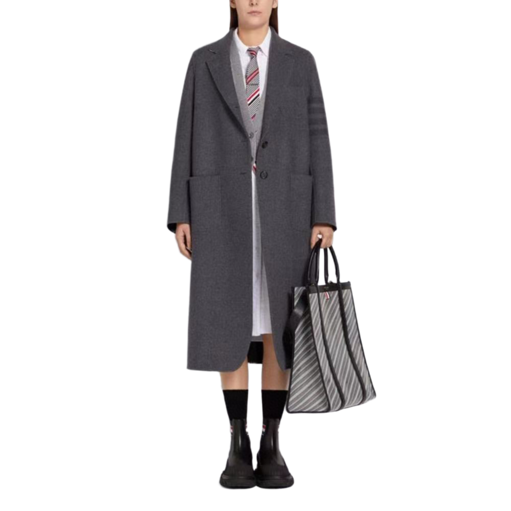 Unisex long wool coat by Thom Browne, outerwear detail view
