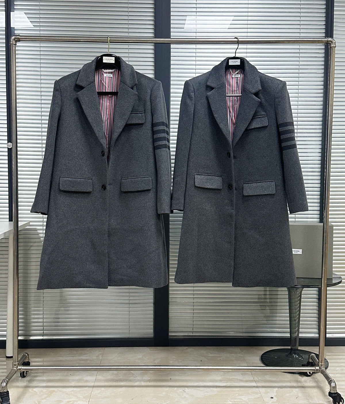 Unisex long wool coat by Thom Browne, outerwear detail view