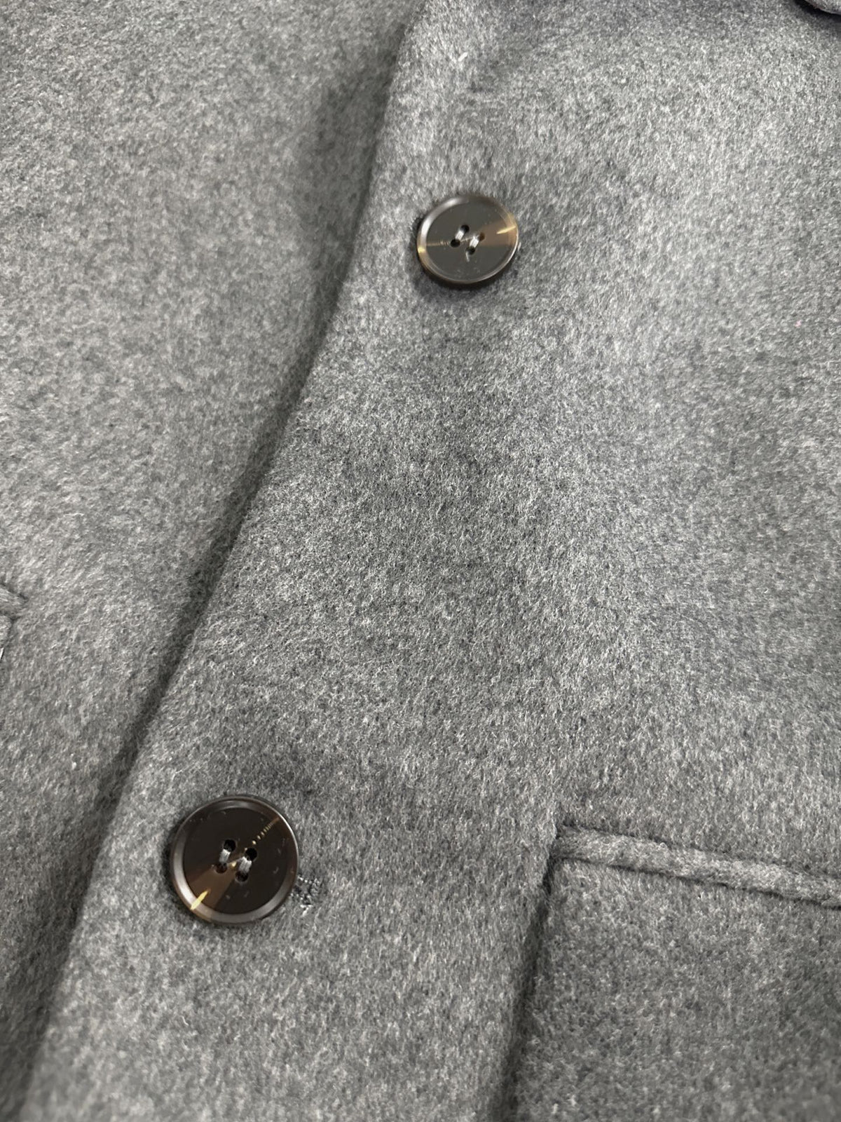 Unisex long wool coat by Thom Browne, outerwear detail view