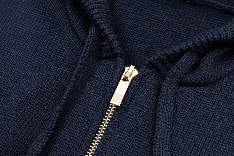 Back puppy hoodie by Thom Browne, outerwear detail view