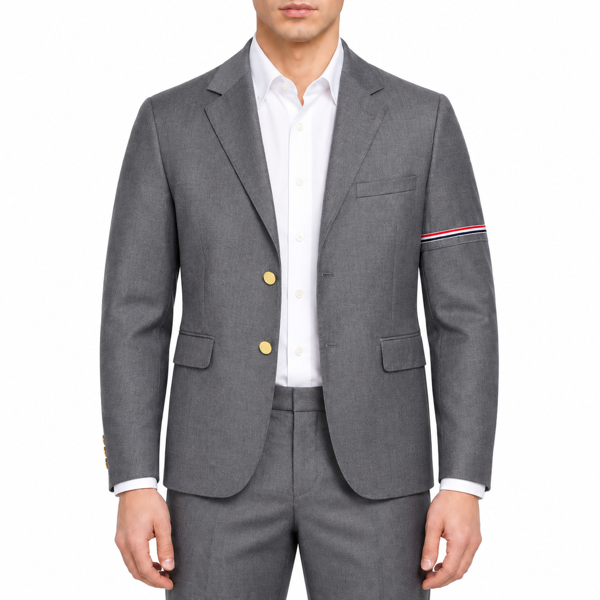 Men's suit jacket by Thom Browne, modeled on a pure white background