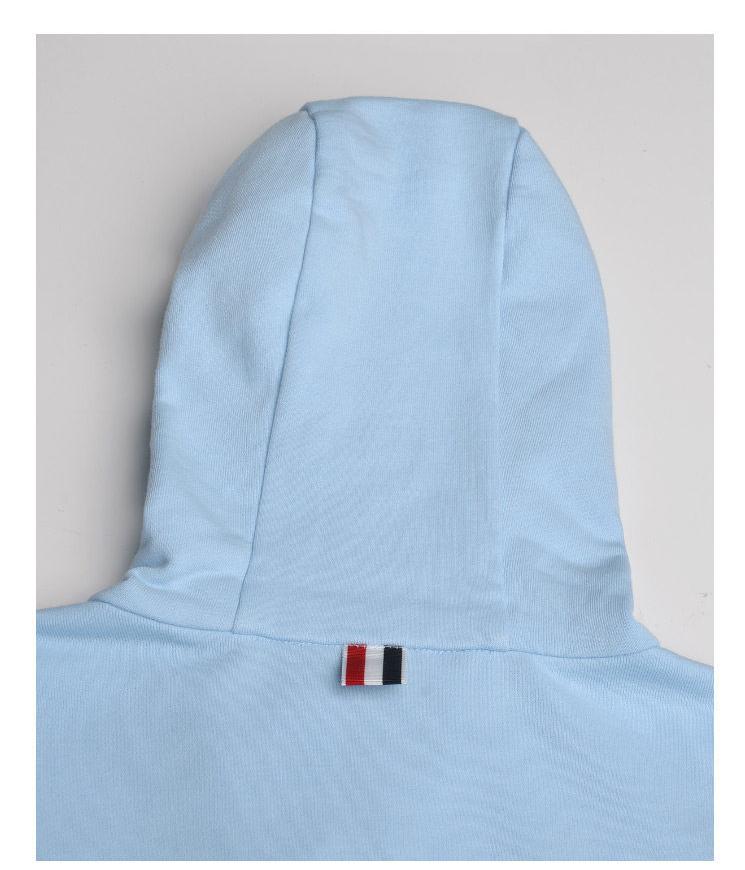 Unisex Four-Bar Hooded Jacket by Thom Browne, garment detail view
