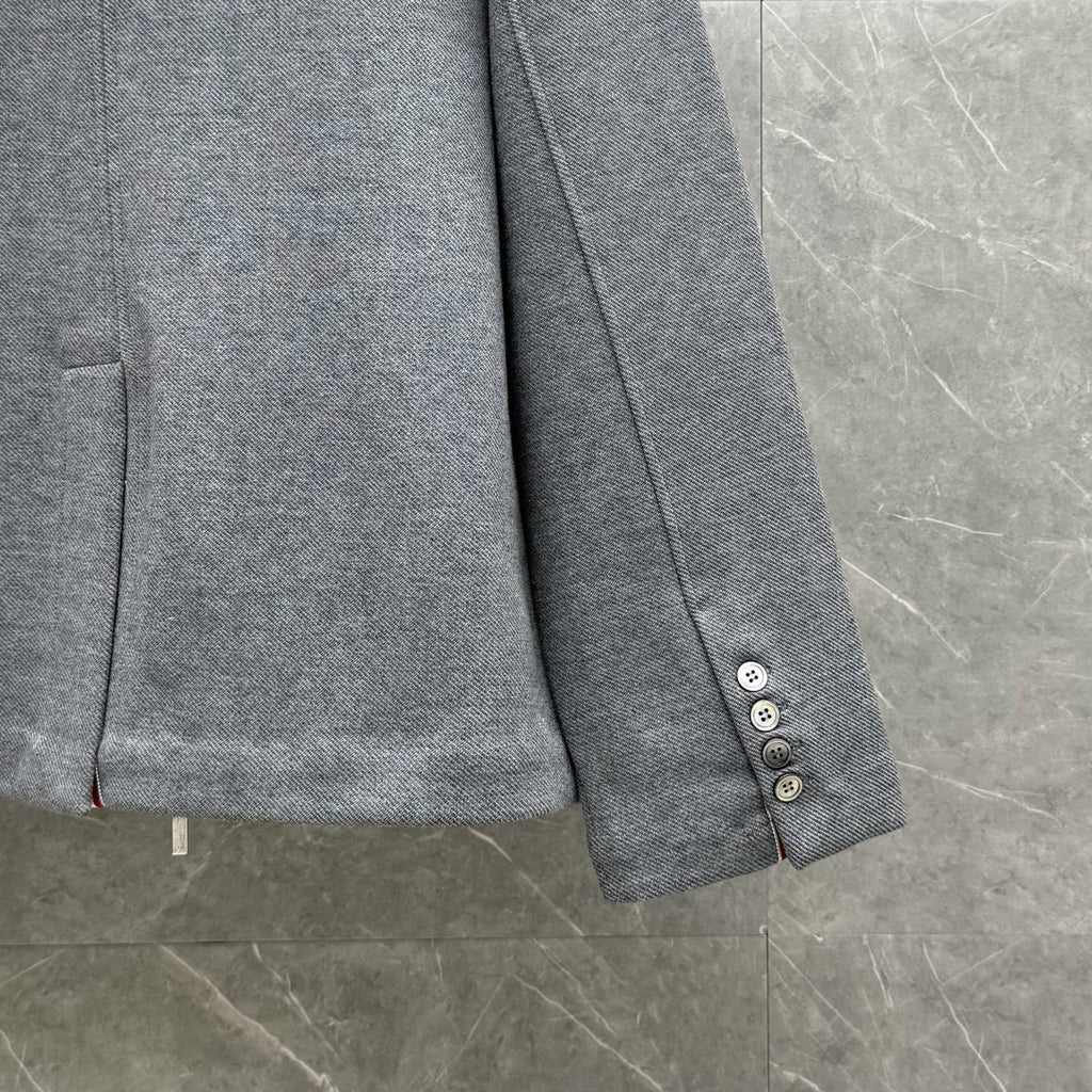 Hooded jacket by Thom Browne, outerwear detail view