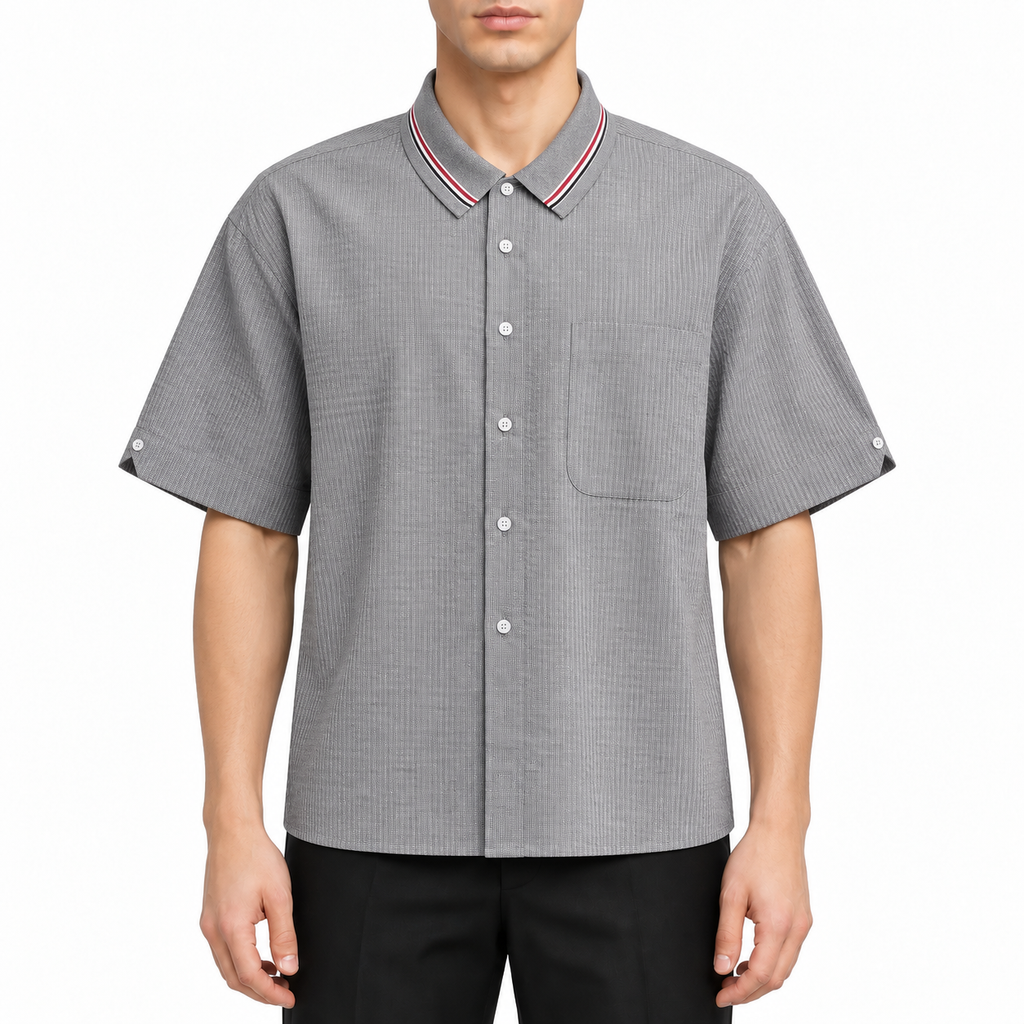 Men's short by Thom Browne, modeled on a pure white background