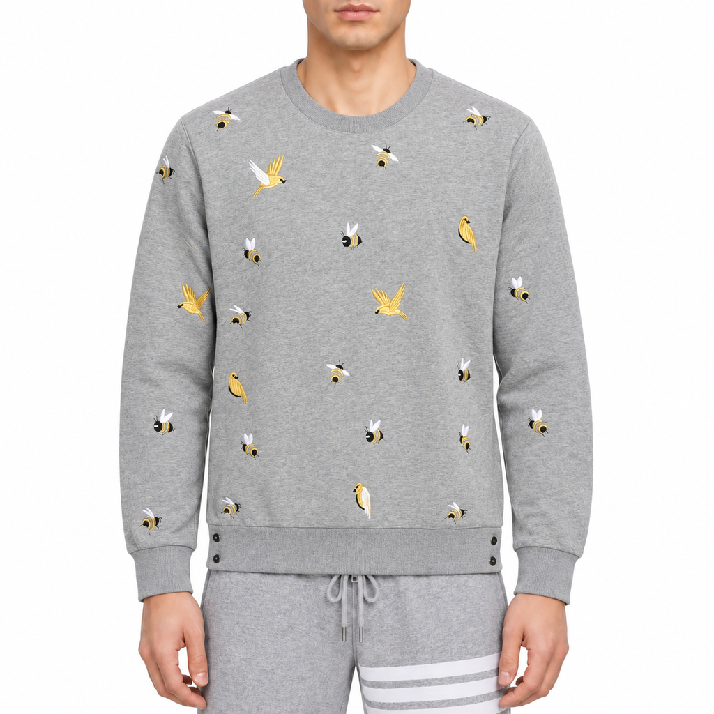 Premium 100% Cotton Embroidered Zip - Up Hoodie - Full - Zip Hooded Sweatshirt by Thom Browne, modeled on a pure white backgr