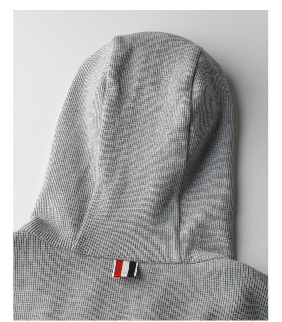 Unisex sweatshirts by Thom Browne, garment detail view