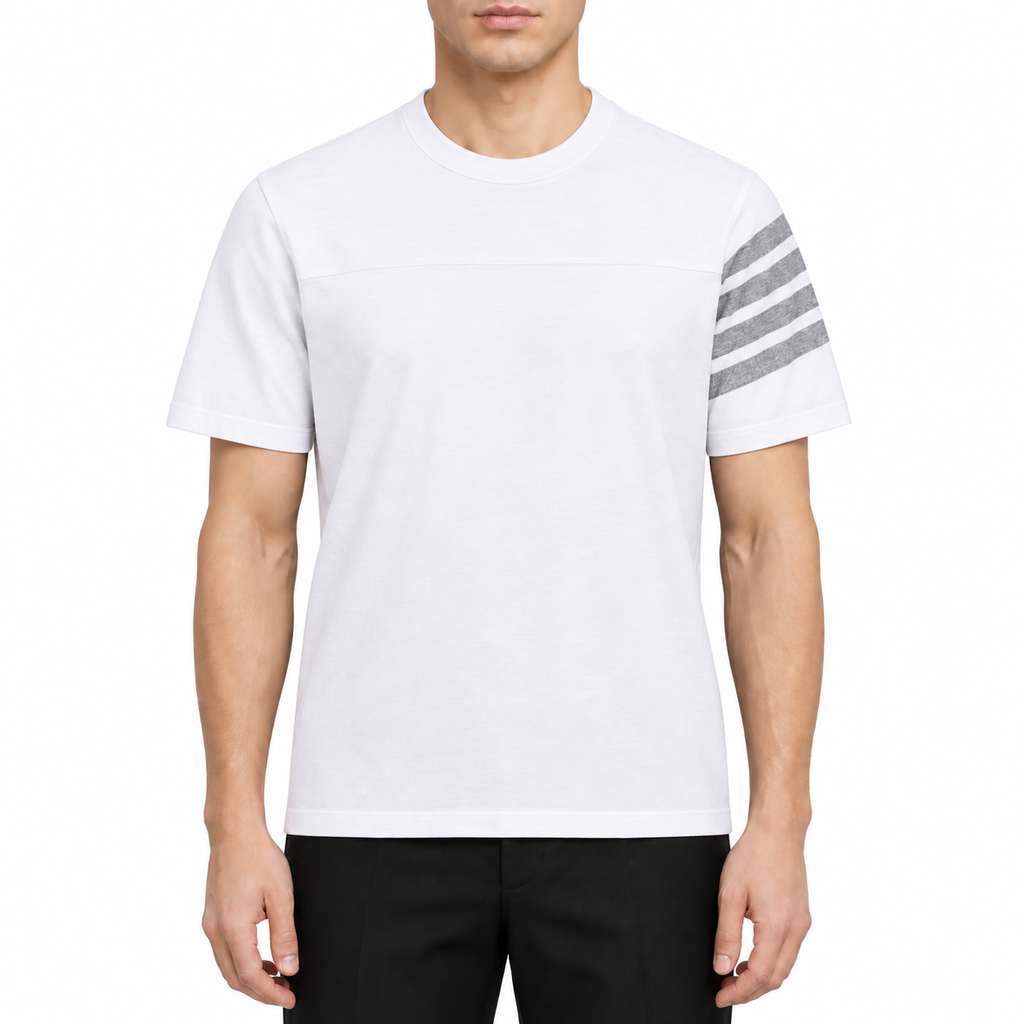 Men's Classics T-shirt by Thom Browne, modeled on a pure white background