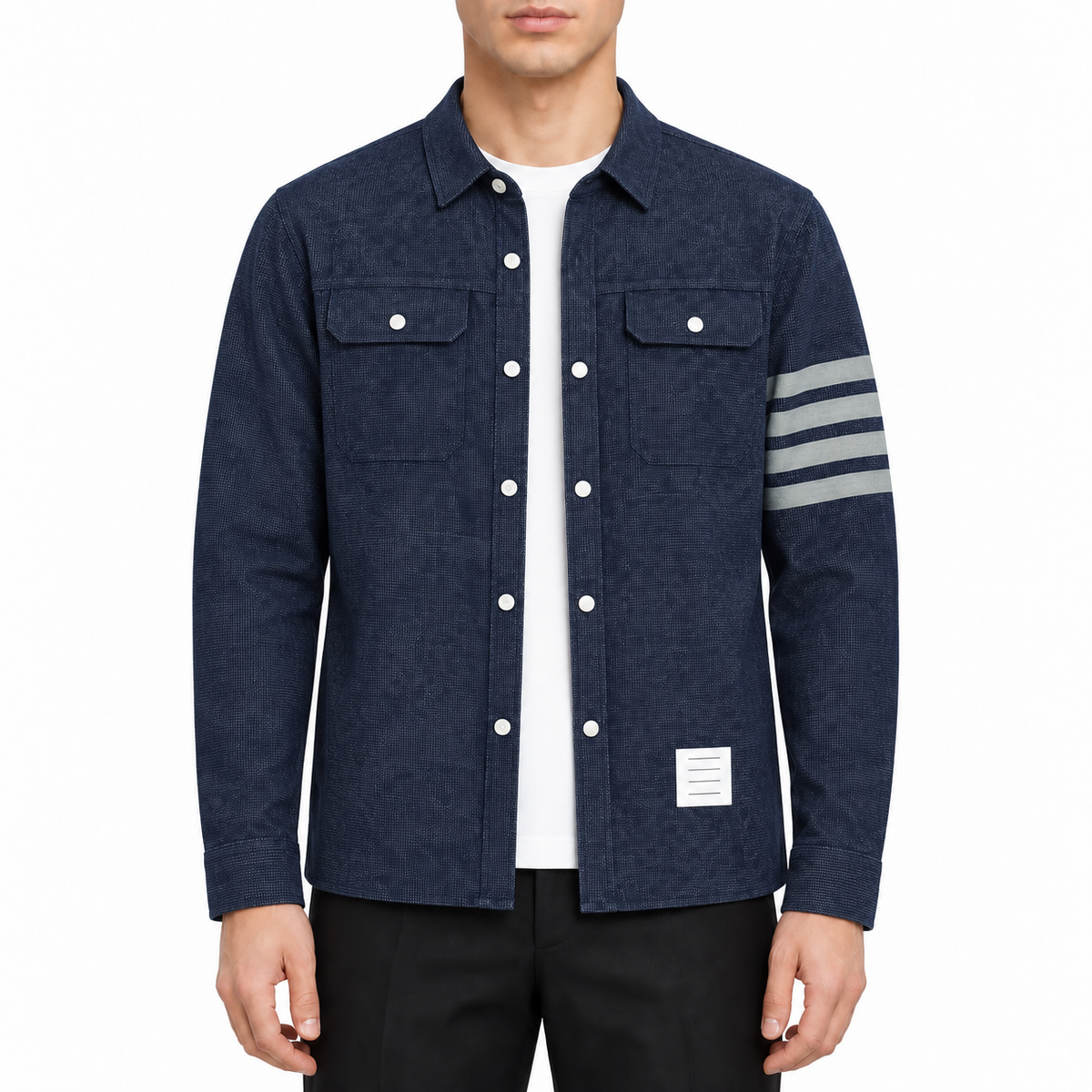 denim shirt by Thom Browne, modeled on a pure white background
