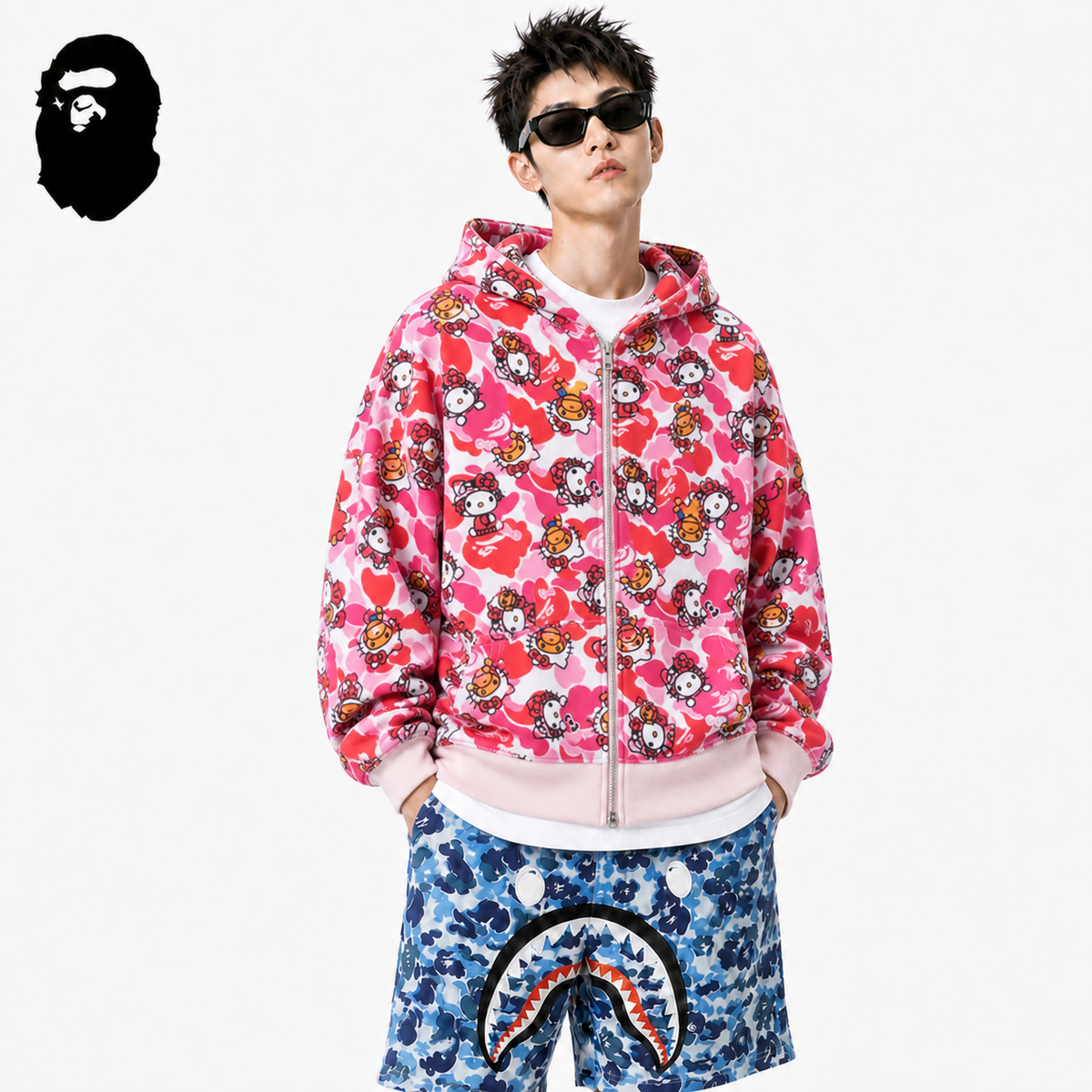 BAPE Hello Kitty Camo Hoodie - Green & Pink styled on a male model