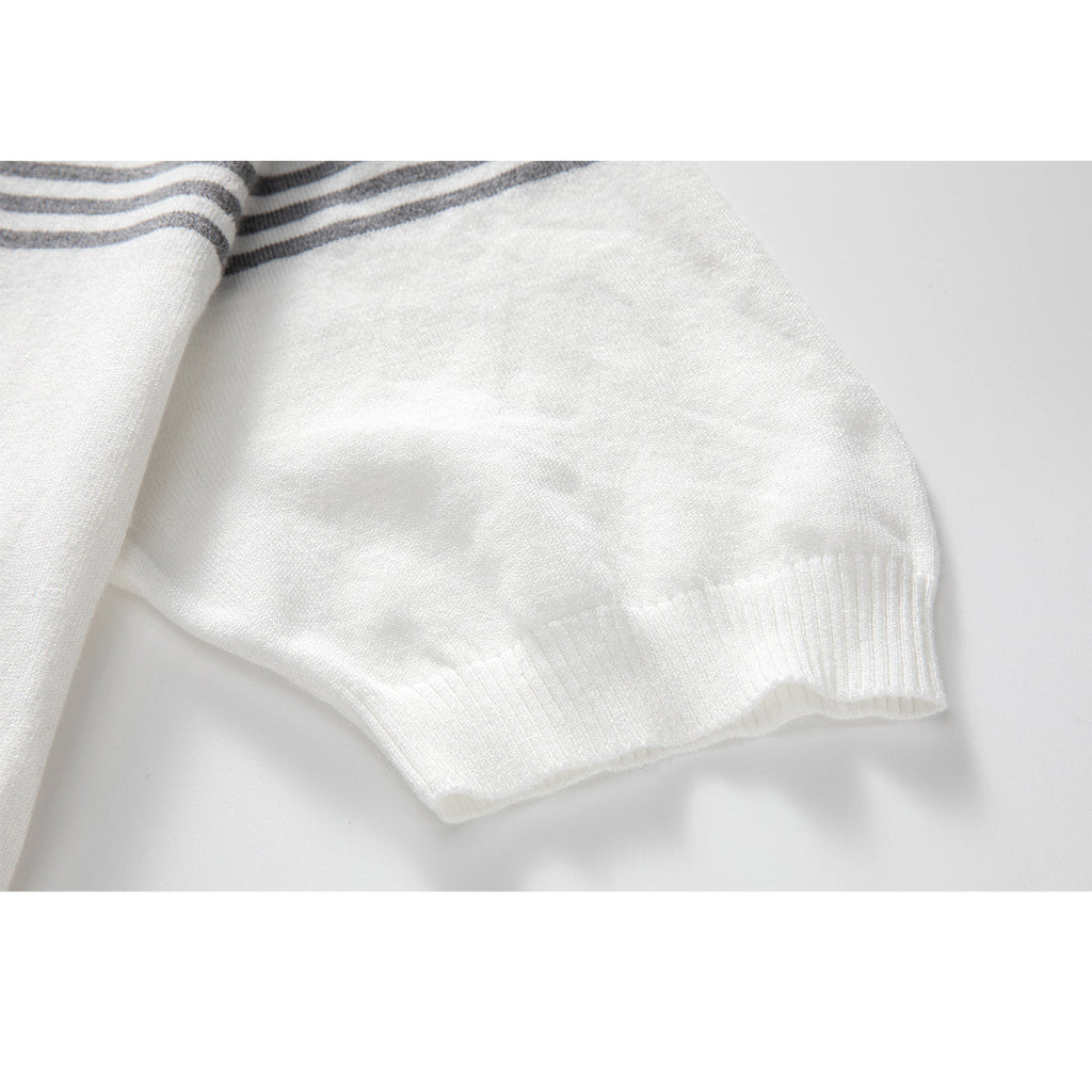 Classic Wool Polo Shirt by Thom Browne, product detail view