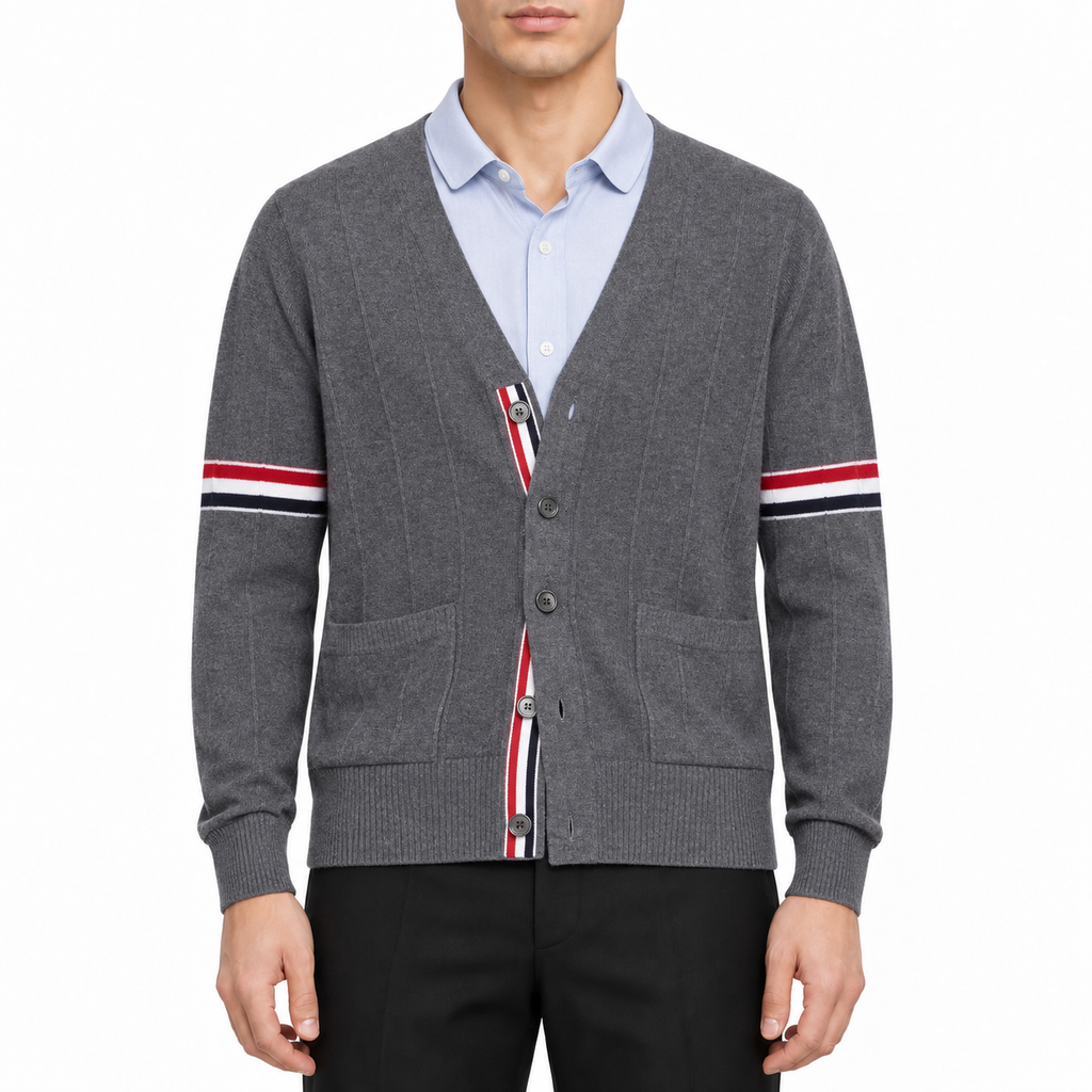 Men's sweater coat by Thom Browne, modeled on a pure white background