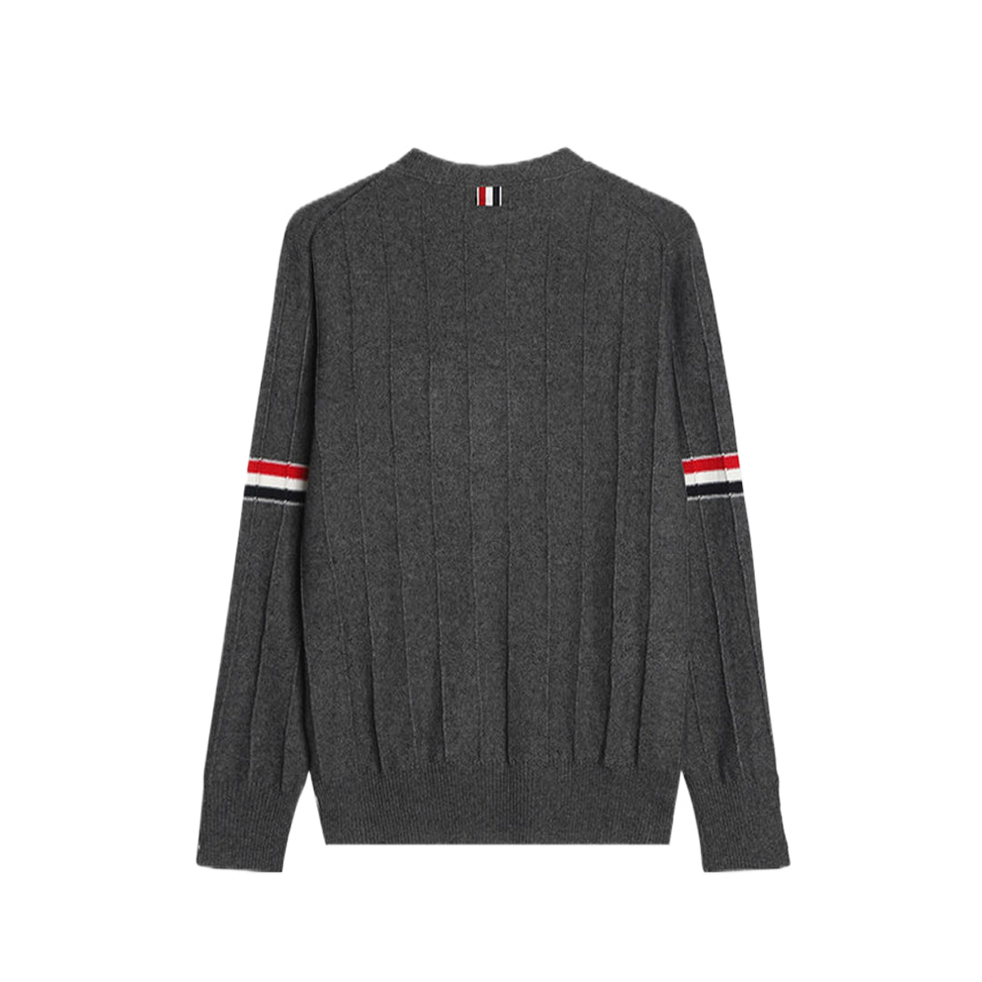 Men's sweater coat by Thom Browne, knitwear detail view