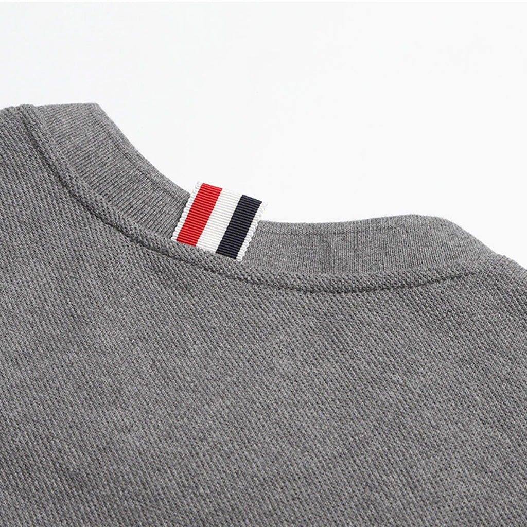 Solid color T-shirt by Thom Browne, product detail view