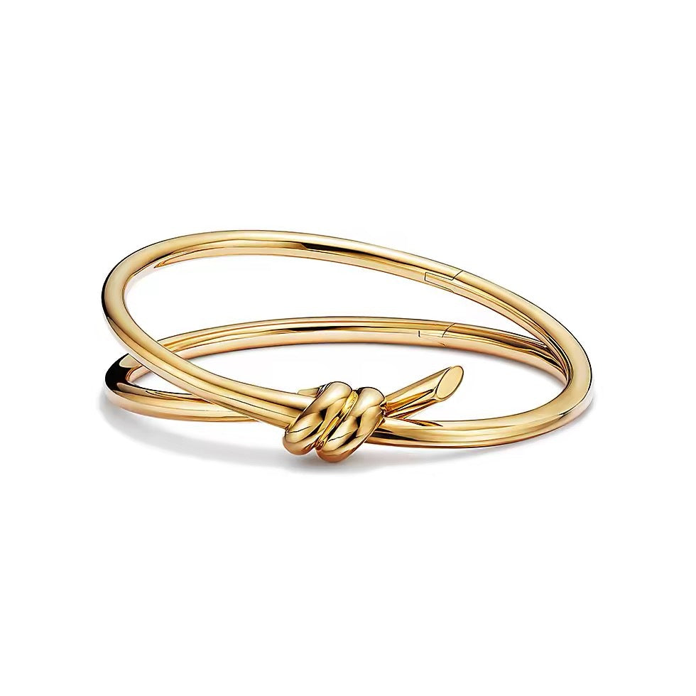 Tiffany Style Knot Cubic Zirconia 18K Gold-Plated Bangle detail view 1