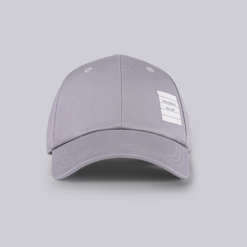 Solid color cap THOM TREND