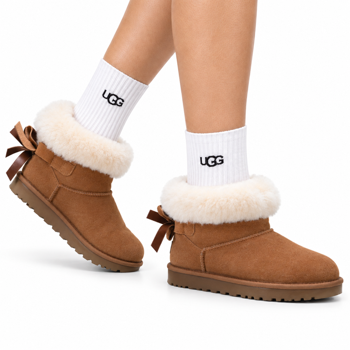 UGG Classic Ultra Mini Bow Ankle Boots - side-angle hero image