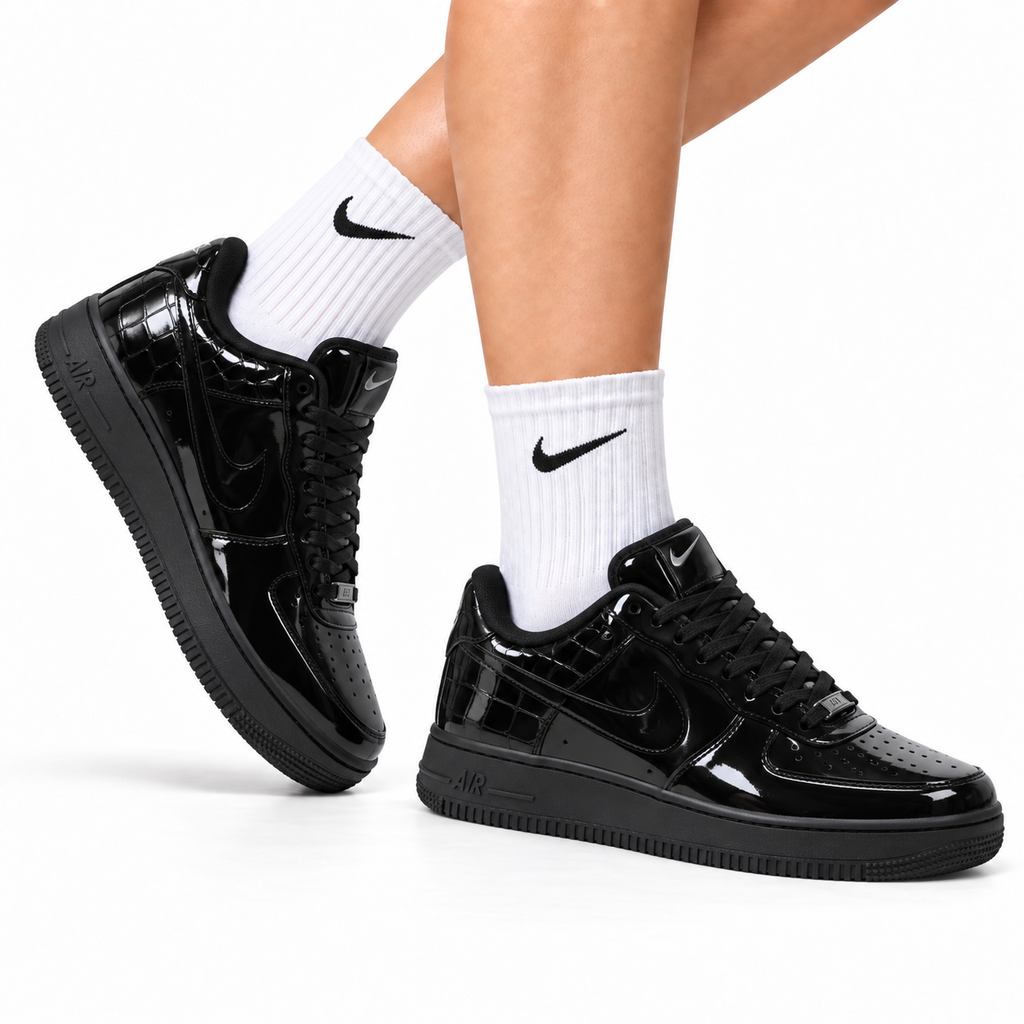 Nike Air Force 1 Low Black Patent Tonal Unisex Sneakers Style 04 main angled pair view