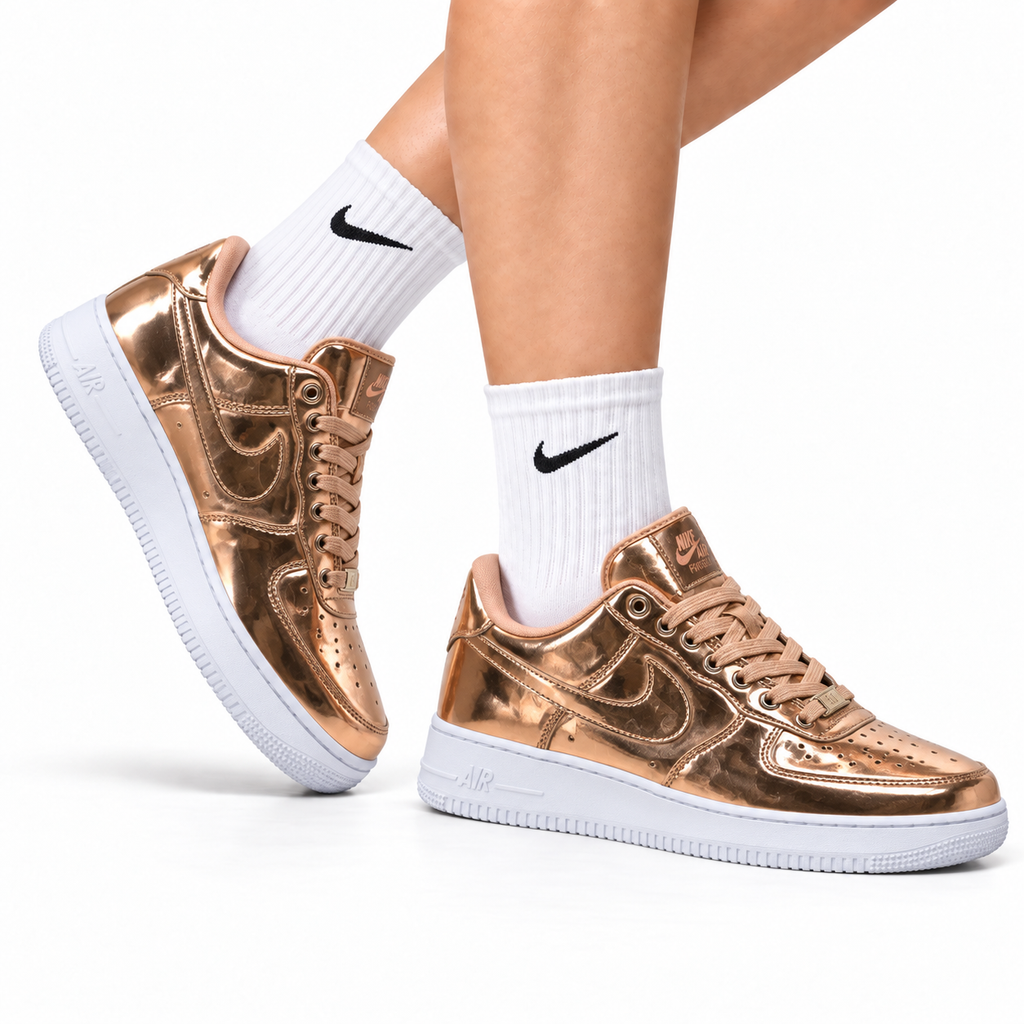 Nike Air Force 1 Low Rose Gold Metallic Unisex Sneakers Style 17 main angled pair view