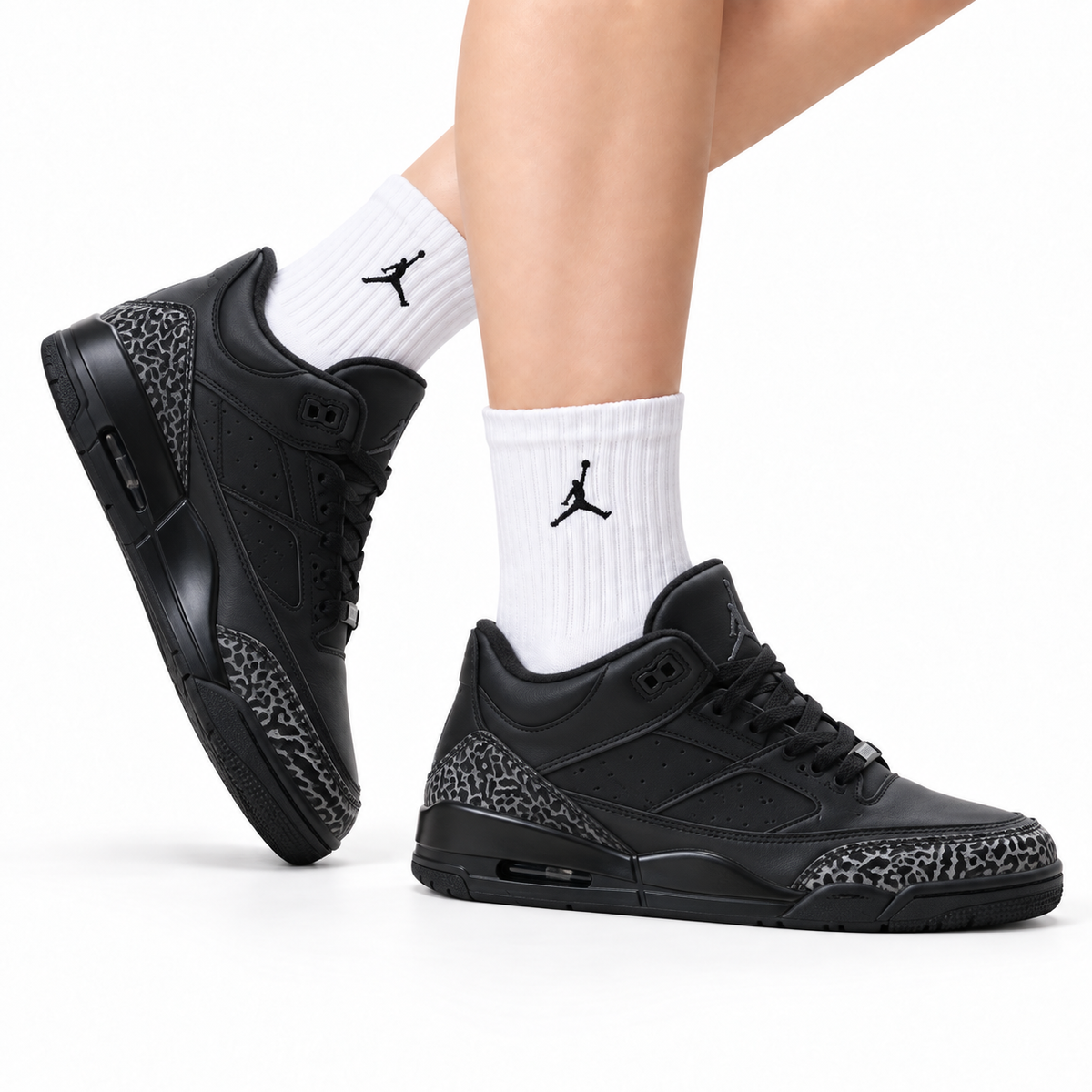 Air Jordan 5 Retro Triple Black Cement Sneakers on-foot product image on a pure white background