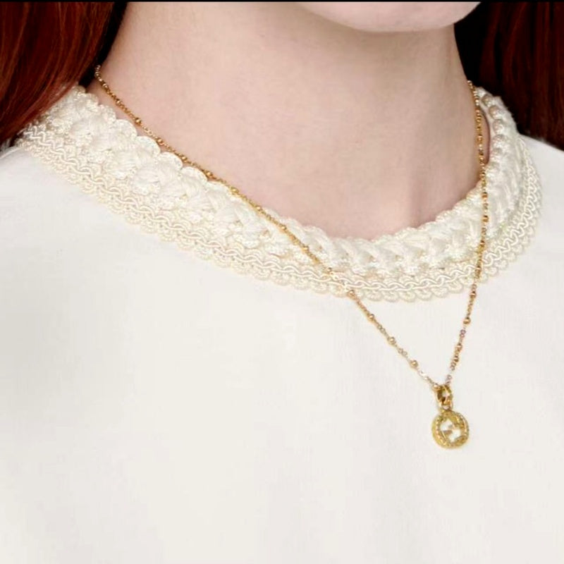Gucci Patterned Figure 8 Necklace detail view 5
